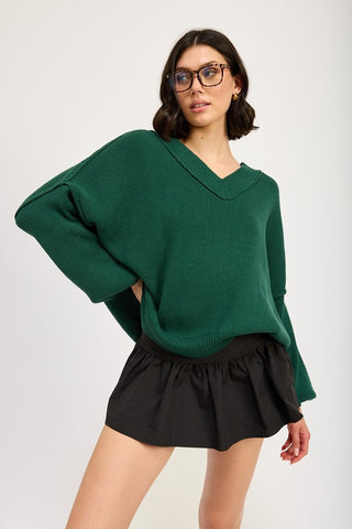 MAGLIONE OVERSIZE CON SCOLLO A V