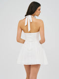 ROBE MINI-HALTER À OEILLETS BLANCHE JOANNA